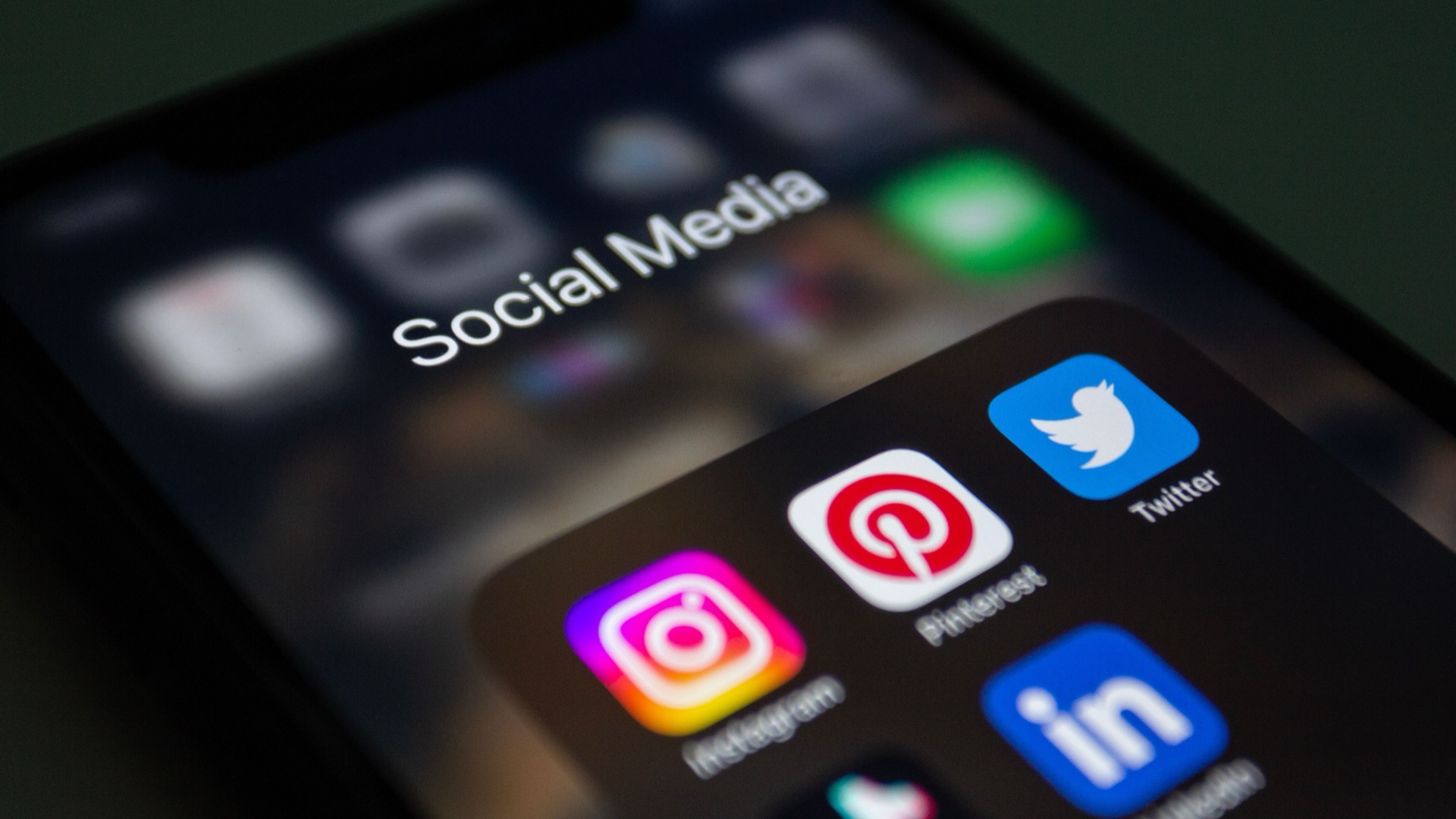 Social media apps in a folder on a phone home screen